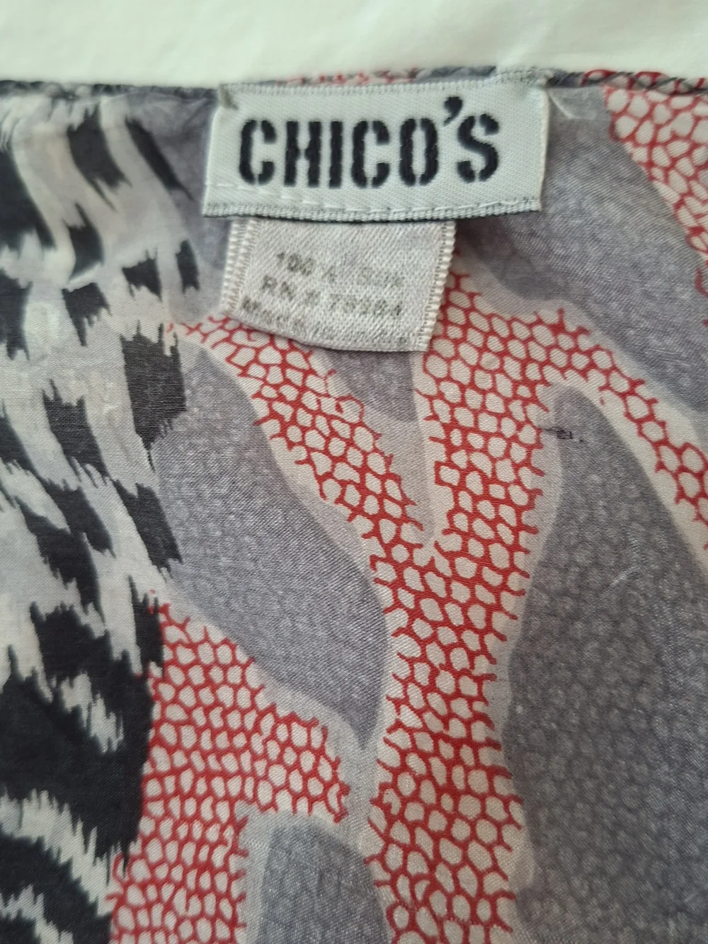 CHICOS LARGE ANIMAL PRINT WITH RED AND GREY LARGE SILK SCARF